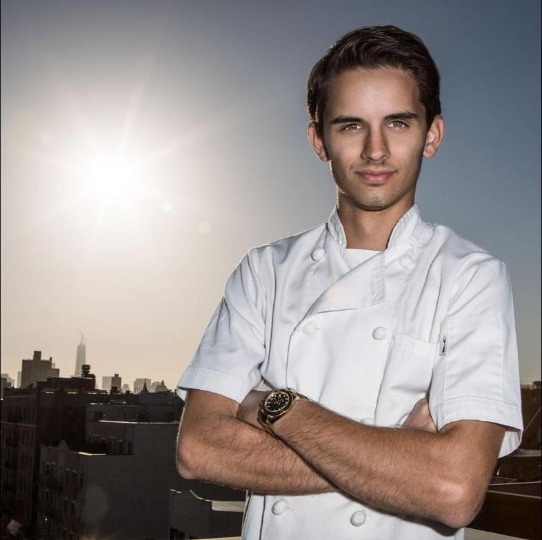 Jose Cabrera in chef whites on a rooftop