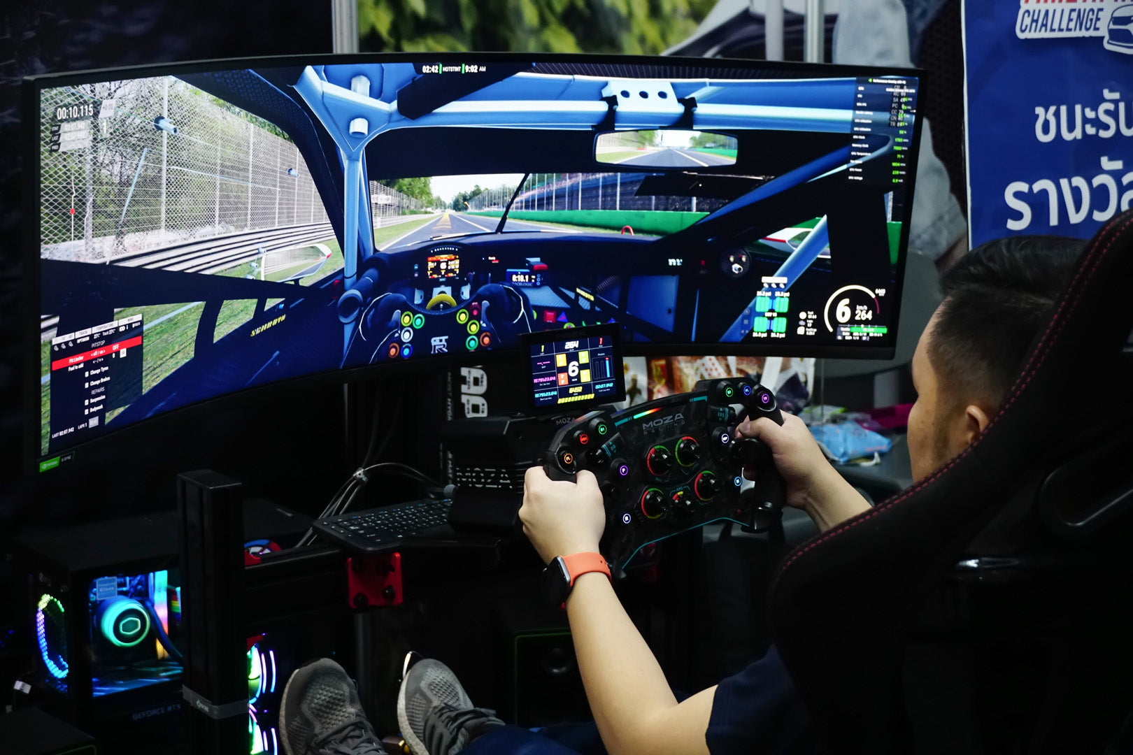 a person on board a racing simulator