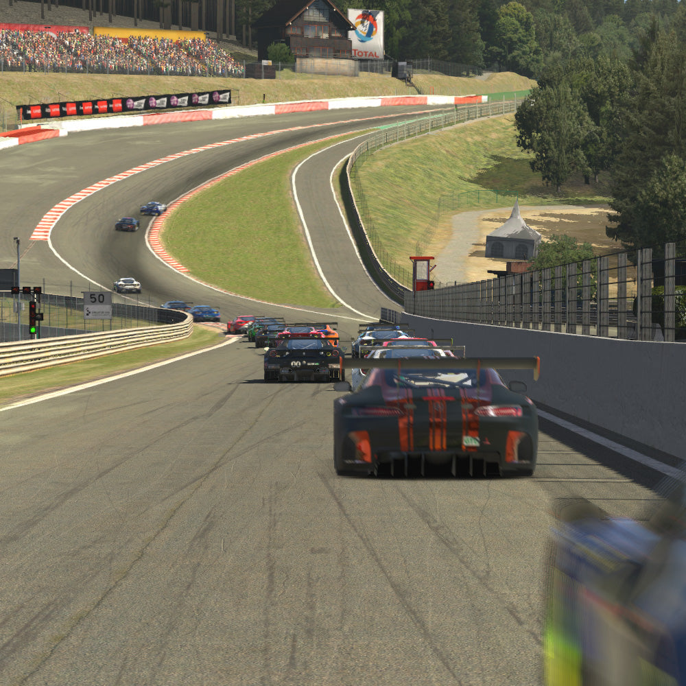 gt3 cars going through eau rouge