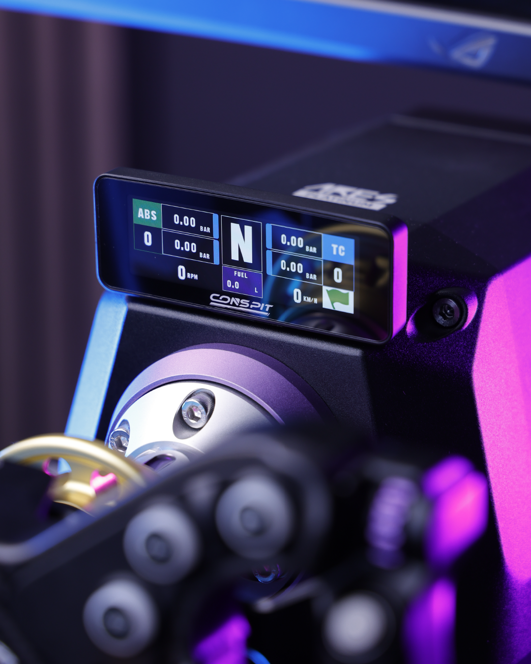 CONSPIT CSD Nano display on the front of a wheelbase behind the wheel
