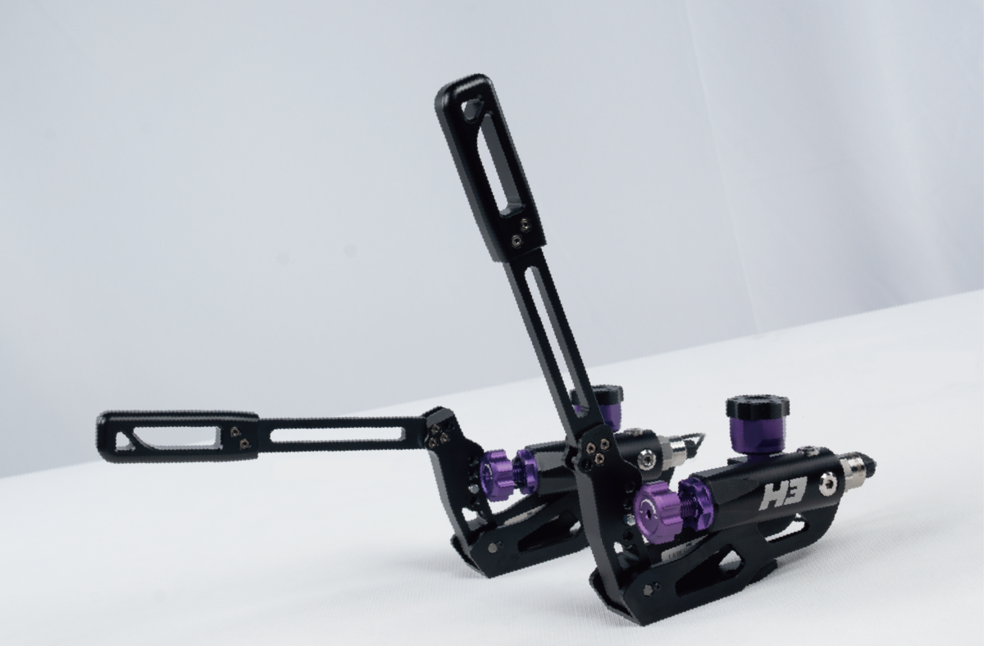 CONSPIT H3 hydraulic handbrake showing both lever positions