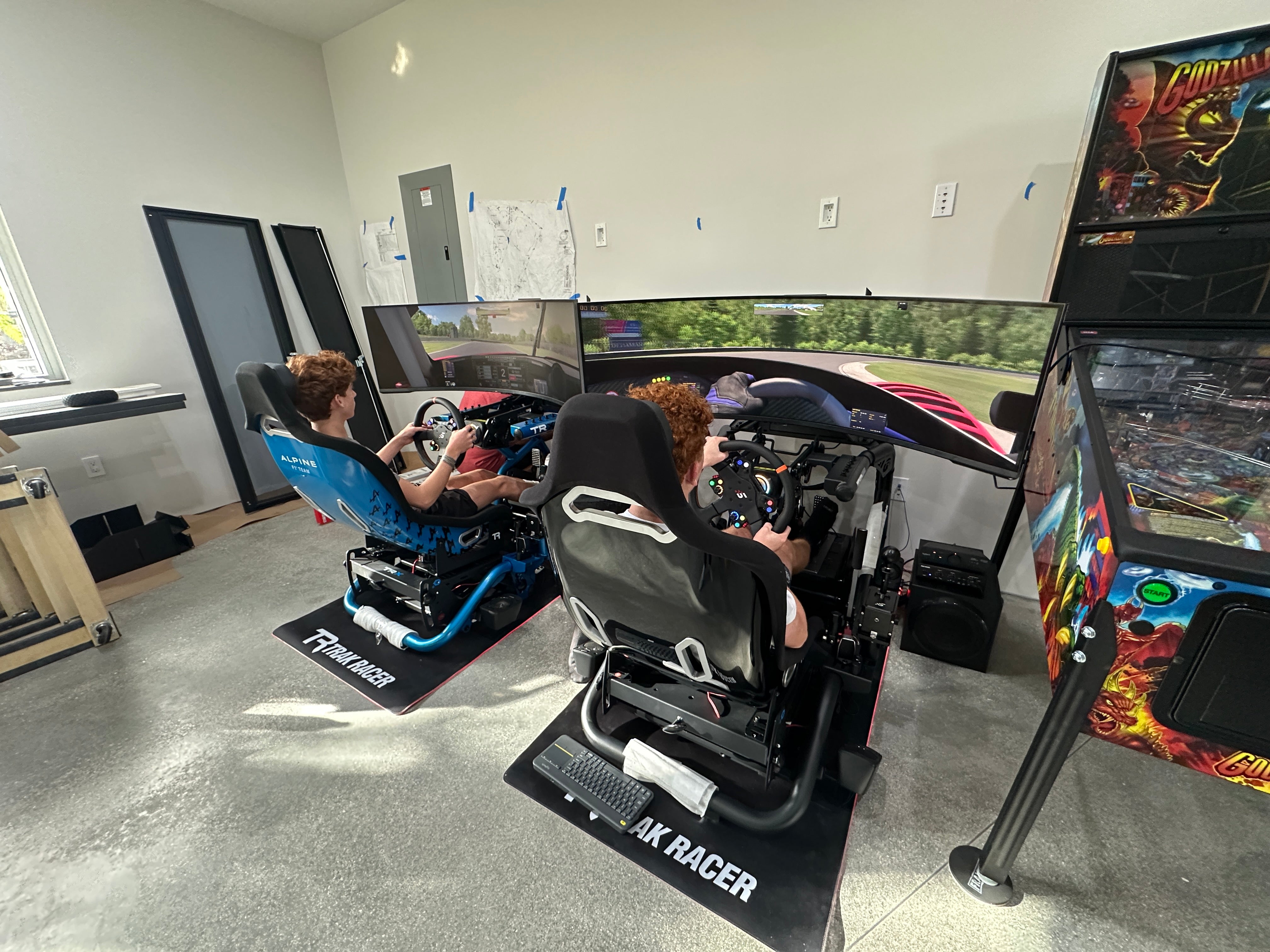two racing simulators set up side by side