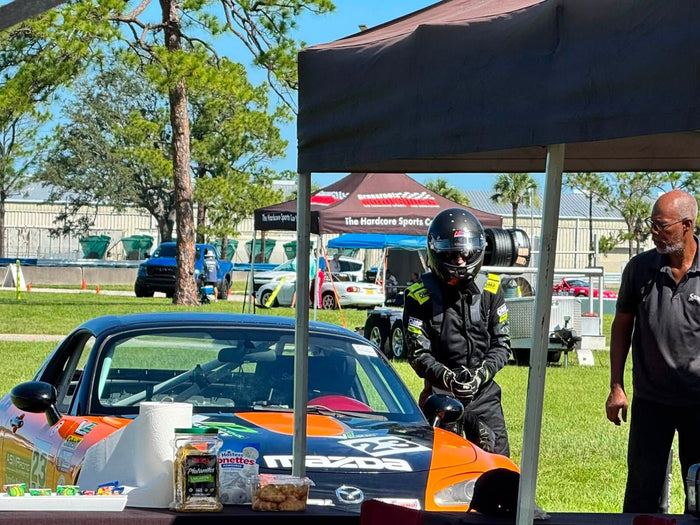 The number 23 MX-5 in the Sebring paddock